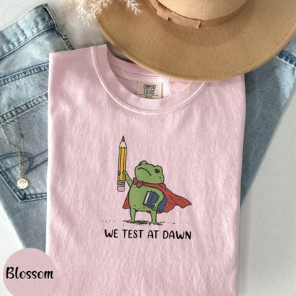 Funny Teacher Frog T-Shirt – “We Test At Dawn” Exam Humor Tee, Classroom Joke Shirt
