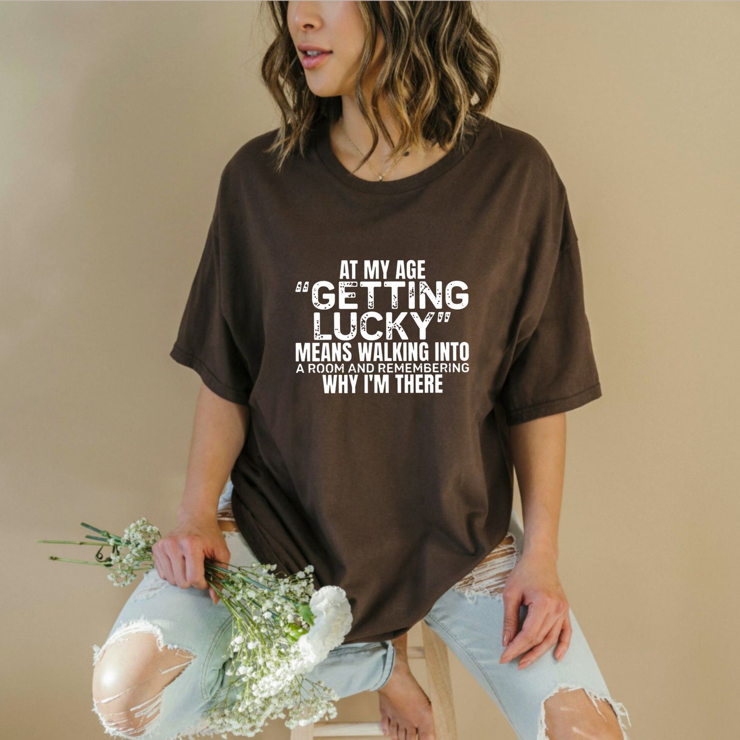 "At My Age Getting Lucky" Funny T-Shirt – Sarcastic Aging Humor Graphic Tee, Unisex Cotton Shirt - Teezioo