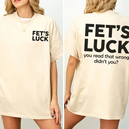 "Fet's Luck" Funny Graphic T-Shirt – Witty Spoonerism Statement Top, Daily Casual Cotton Womenswear, Sassy Humor Aesthetic Tee. - Teezioo